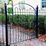 Decorative Wrought Iron Fence and Arched Walk Gate