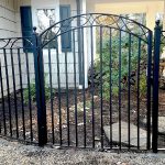 3-Rail Iron Fencing with Arched Gate and Ball Post Caps